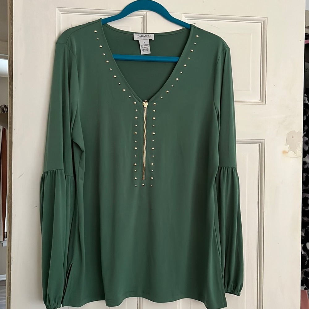 Woman’s blouse by Carmen.